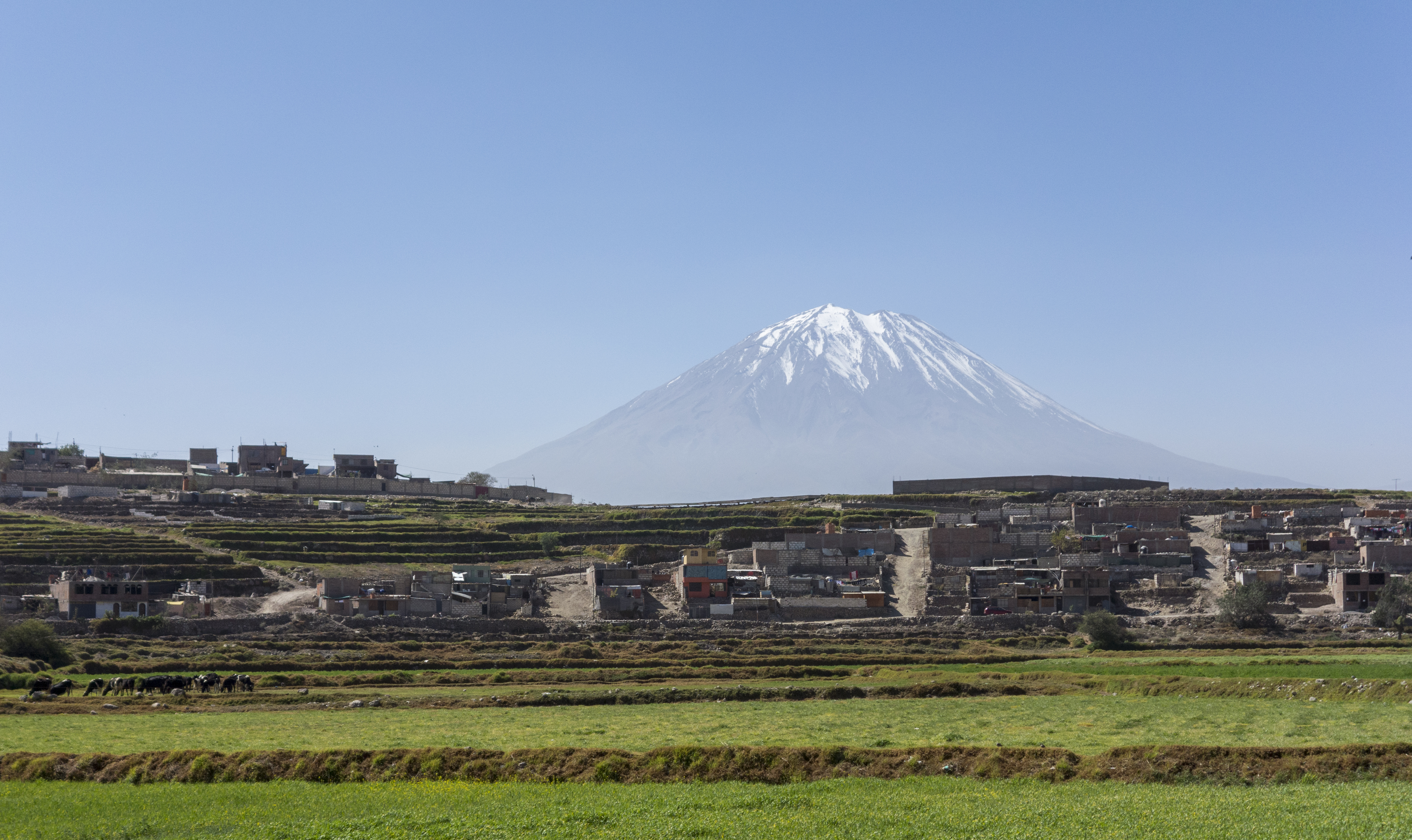 The Andean volcano Misti rises above the terraced agricultural land that surrounds the city of Arequipa, Peru,photo by A.Davey, 2013, CC BY-NC-ND 2.0 license