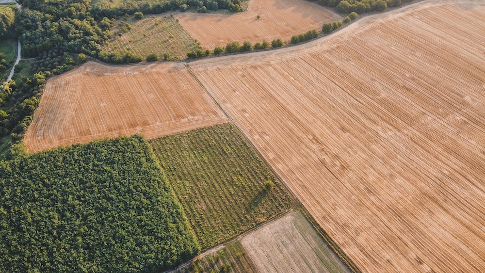 Aerial shot of cropland in Romania, photo by Czapp Árpád, public domain