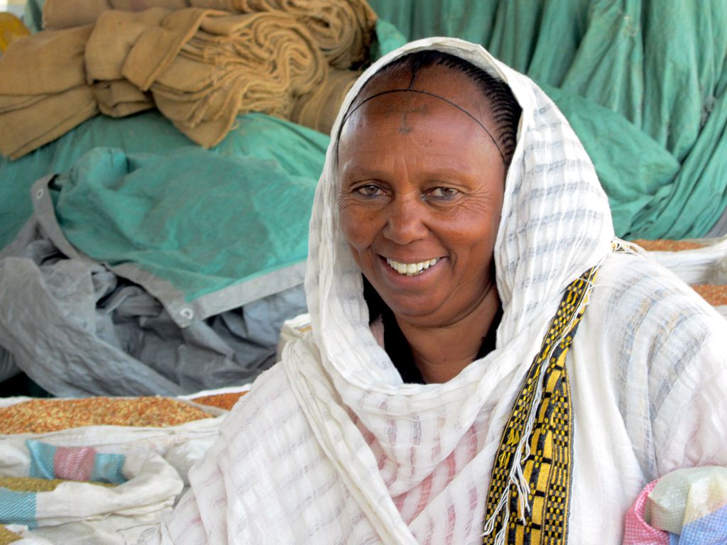 Woman at the grain market in Keren. Photo by David Stanley via Flickr (CC-BY-2.0)