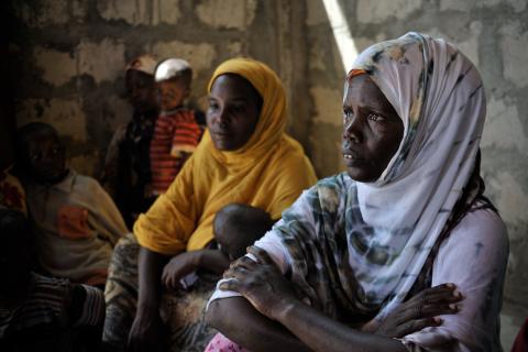 Women and their babies wait patiently at a medical clinic in Mogadishu,
